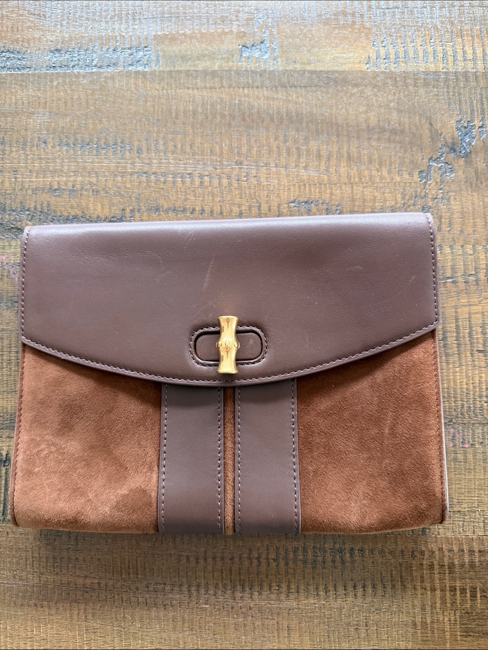 J McLaughlin leather and suede clutch